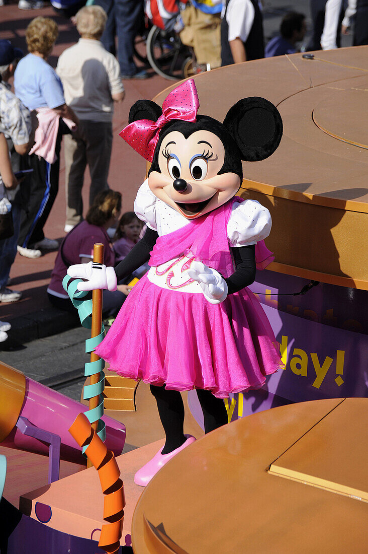 Minnie Mouse on Float in Parade at Walt Disney Magic Kingdom Theme Park Orlando Florida Central,L54-870223 - © - Dennis MacDonald