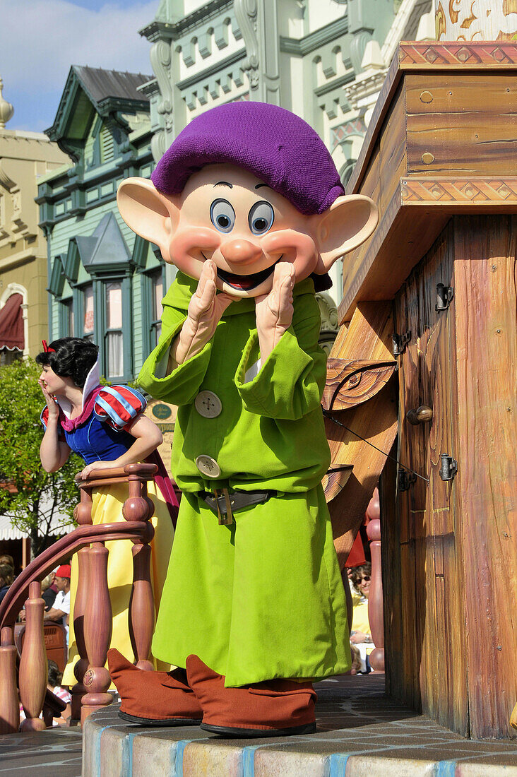 Dopey the Dwarf in parade at Walt Disney Magic Kingdom Theme Park Orlando Florida Central