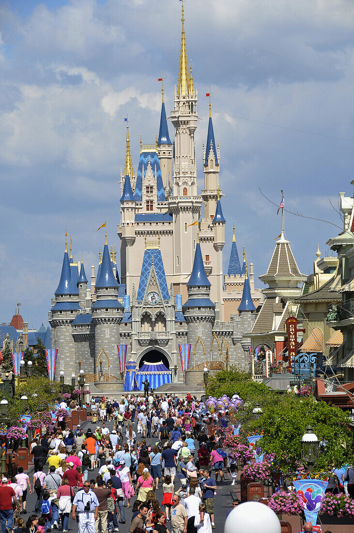 Crowd in front of Cinderella Castle at Walt Disney Magic Kingdom Theme Park Orlando Florida Central