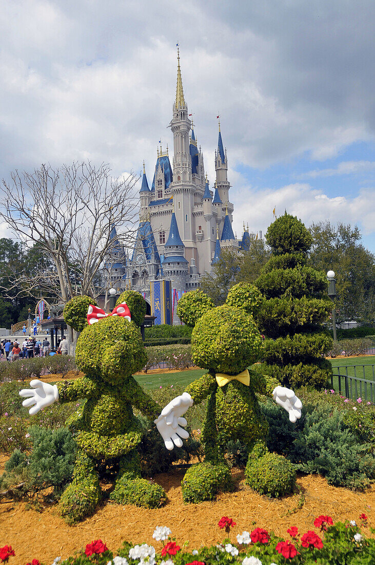 Topiaries of Mickey and Minnie Mouse at Walt Disney Magic Kingdom Theme Park Orlando Florida Central
