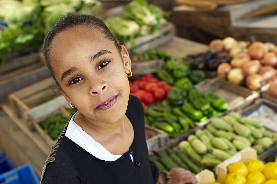 cute little girl at vegetable market  ras al-khaimah  united arab emirates  middle east