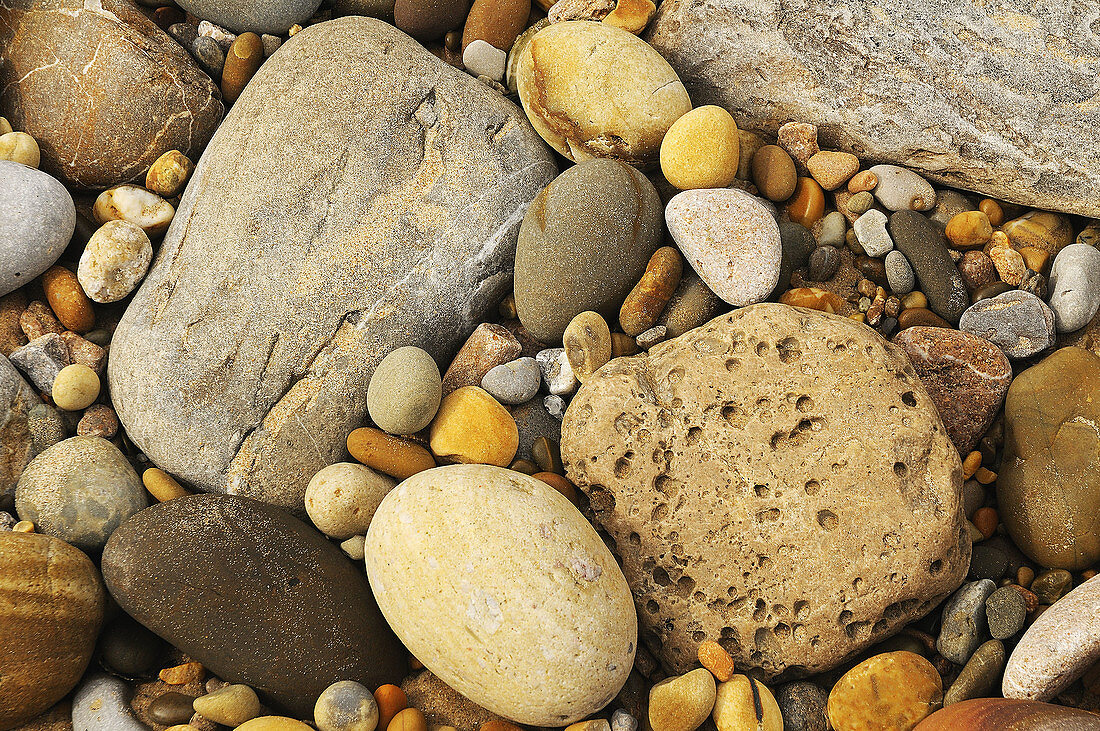 Pebbles on beach,  Oyambre,  Cantabria,  Spain