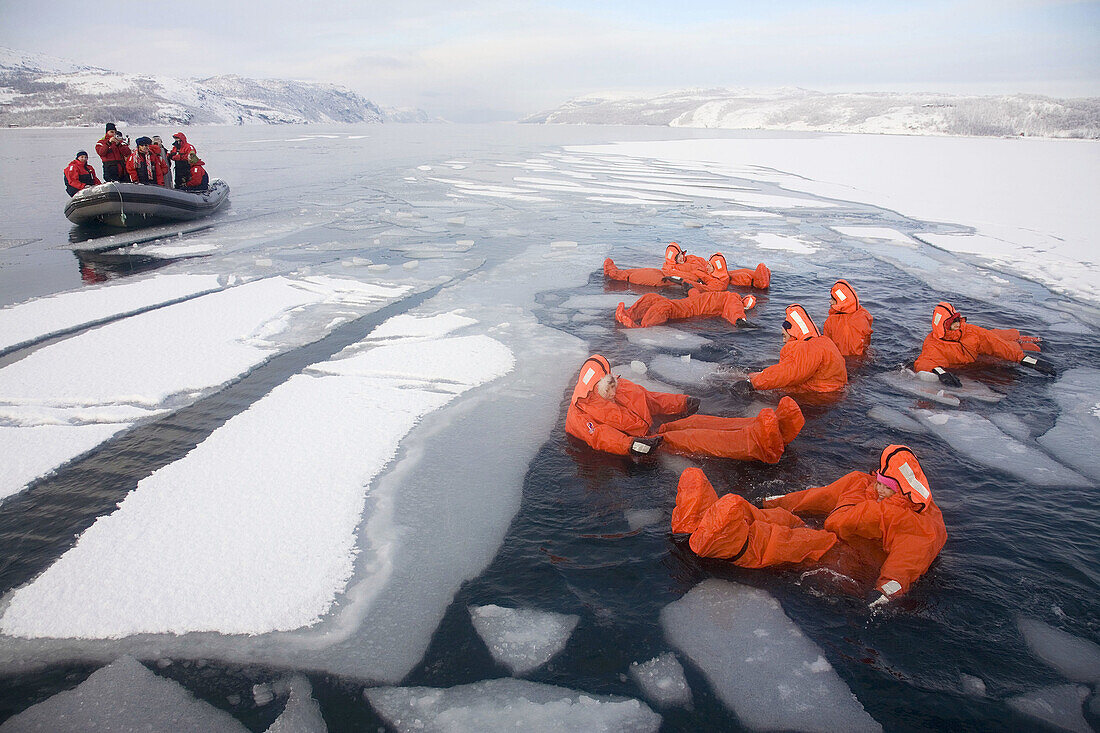 Norway,  Kirkeness,  near to the Russian border Jarfjord Fiord Frozen water swimming