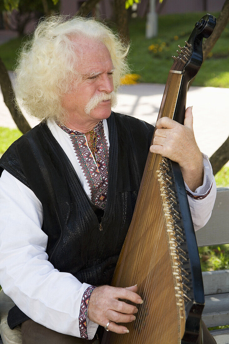 Ukraine Kiev Musician Musical instrument: Kobza
