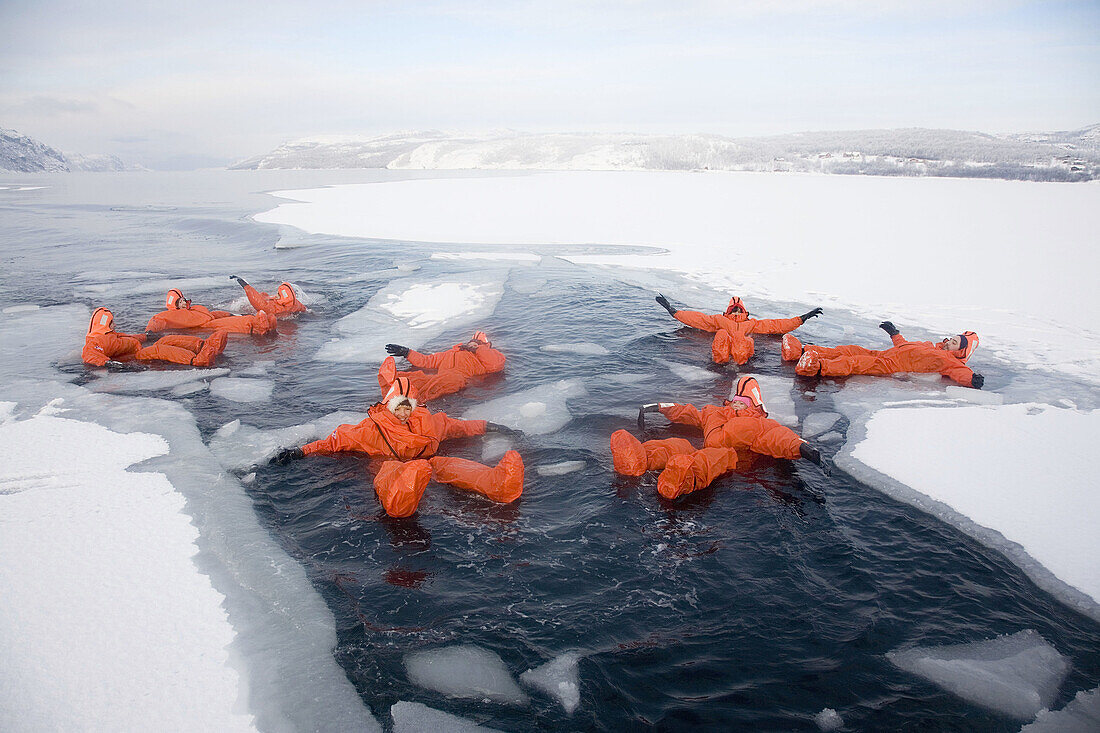 Norway,  Kirkeness,  near to the Russian border Jarfjord Fiord Frozen water swimming