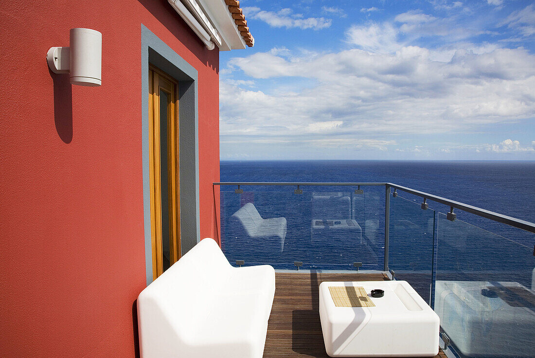 Portugal,  Madeira Islands Ponta do Sol Terrace overlooking the sea at Quinta da Rochina,  Design Hotel