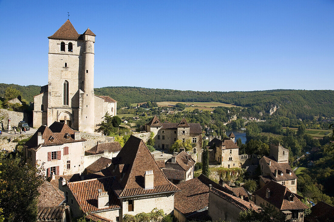 France,  Midi Pyrenees,  Lot,  Saint-Cirq-Lapoppie Church Lot river The medieval village is located 30 km East from Cahors in the middle of the Regional natural park of Causses of Quercy