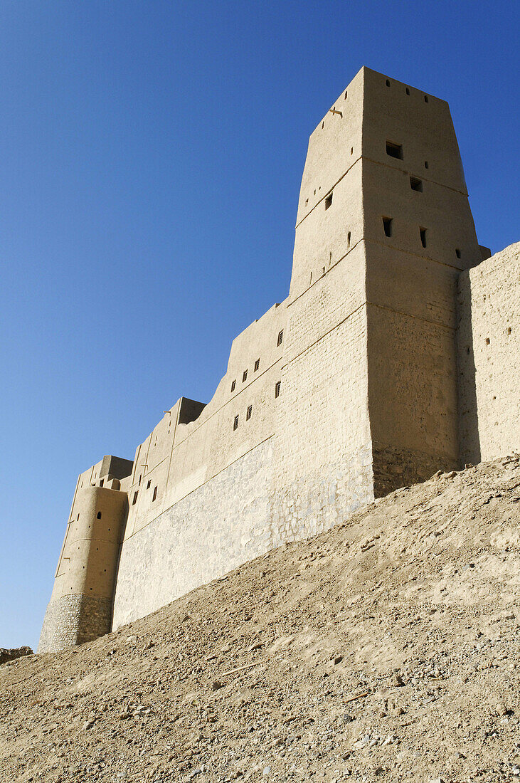 historic adobe fortification,  Bahla fort or castle,  UNESCO World Heritage Site,  Hajar al Gharbi Mountains,  Dhakiliya Region,  Sultanate of Oman,  Arabia,  Middle East