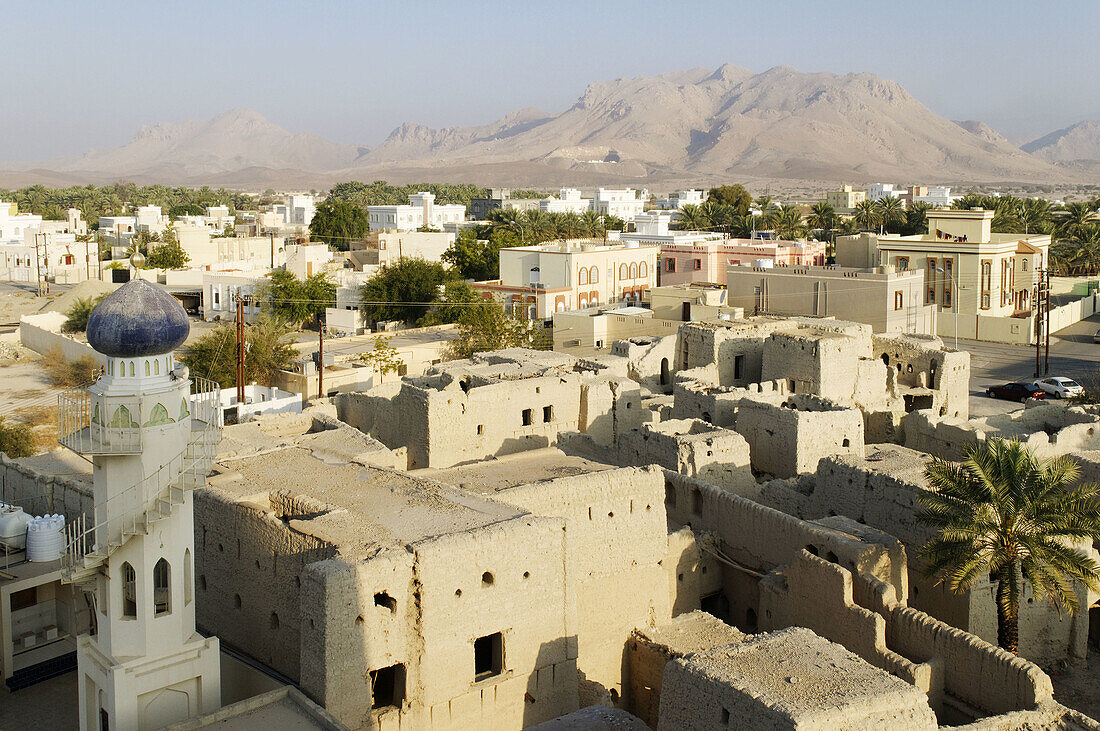 view from the historic adobe fortification Nizwa Fort or Castle,  Hajar al Gharbi Mountains,  Dhakiliya Region,  Sultanate of Oman,  Arabia,  Middle East