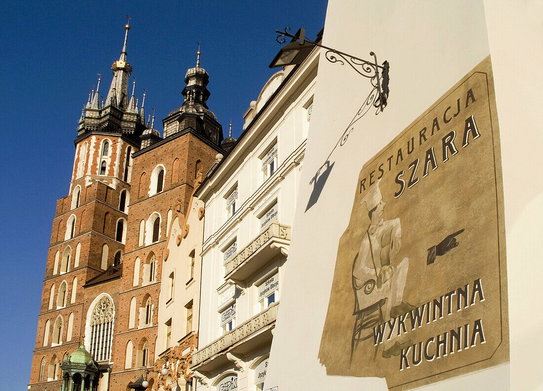 Poland,  Krakow,  Church of St Mary and Szara Building at Main Market Square