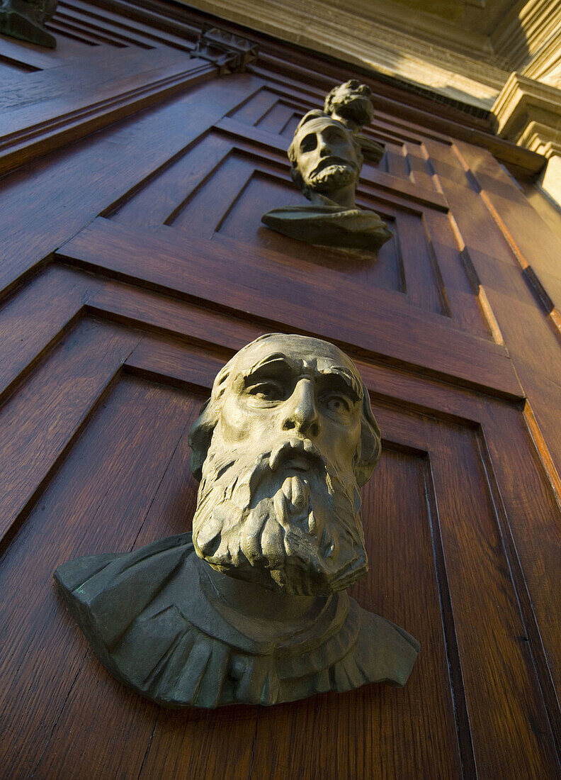 Poland Krakow main doors with heads of St Mary´s Church
