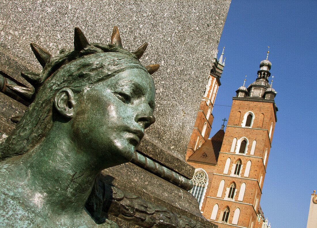 Poland,  Krakow,  Monument of great Polish poet Adam Mickiewicz,  detail and St mary´s Basilica