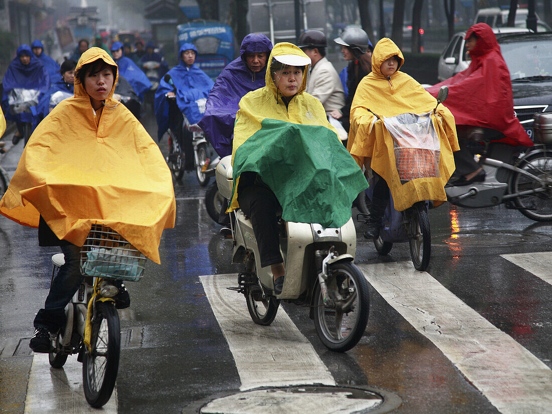 China,  Jiangsu Province,  Suzhou,  communters on motorcycles