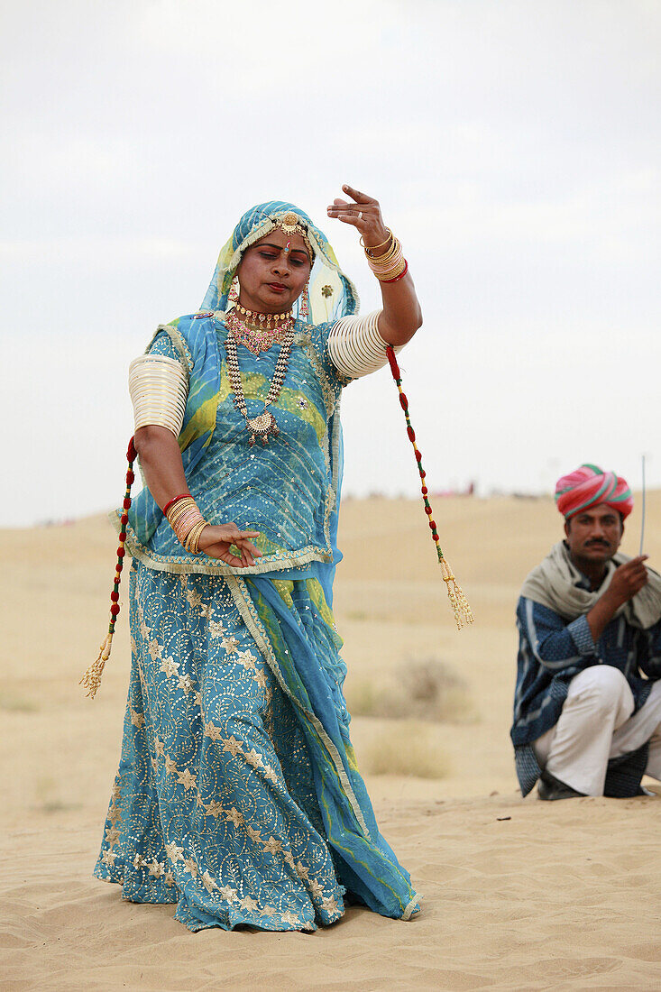 India,  Rajasthan,  Thar Desert,  Sam Sand Dunes,  dancing rajasthani woman
