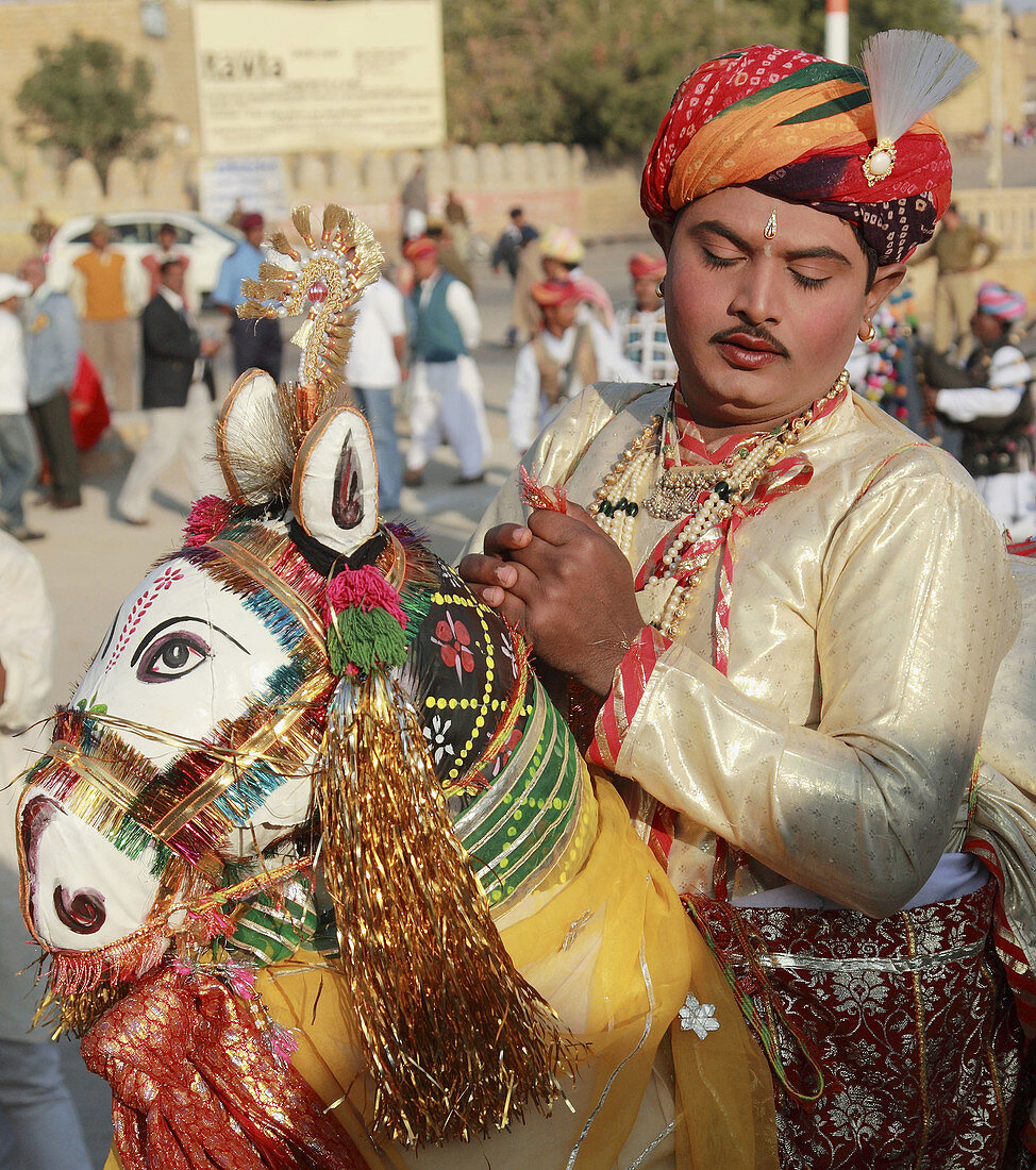 India,  Rajasthan,  Jaisalmer,  Desert Festival,  entertainer with horse figure