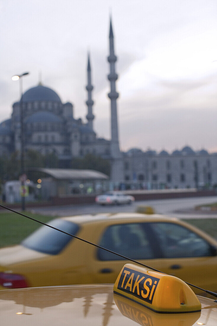 Yellow taxi in front of mosque, Istanbul, Turkey, Europe