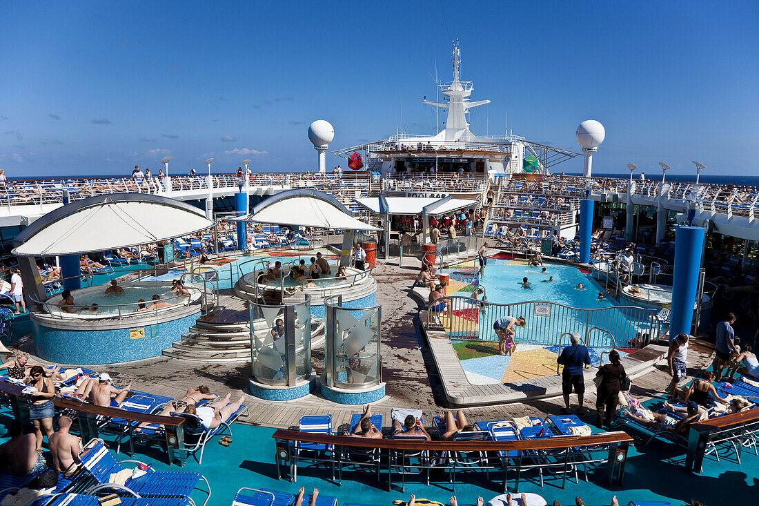 Boat, Caribbean, Color, Colour, Contemporary, Cruise, Deck, Fun, Holiday, Leisure, Navigator, Play, Pool, Recreation, Relax, Relaxation, Seas, Ship, Sun, Sunning, Suntan, Swimming, Tan, Tanning, The, Tourism, Travel, Vacation, XL6-834464, agefotostock 