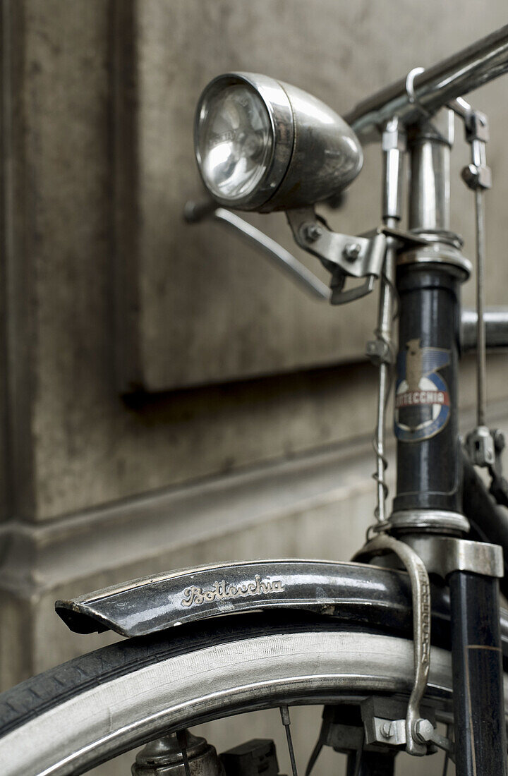 Aged, bicycle, bicycles, bike, bikes, biking, Close up, Close-up, Closeup, Color, Colour, Concept, Concepts, cycle, cycles, Daytime, detail, details, exterior, Headlight, Headlights, Metal, Old, Old fashioned, Old-fashioned, One, outdoor, outdoors, outsid