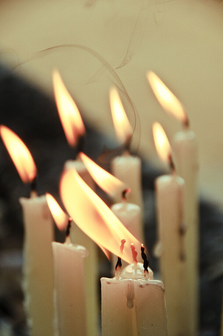 Candles burning at a Christian shrine Vypeen Island,  Kerala,  India