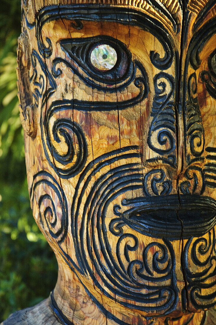 A carved Maori statue Picton,  New Zealand