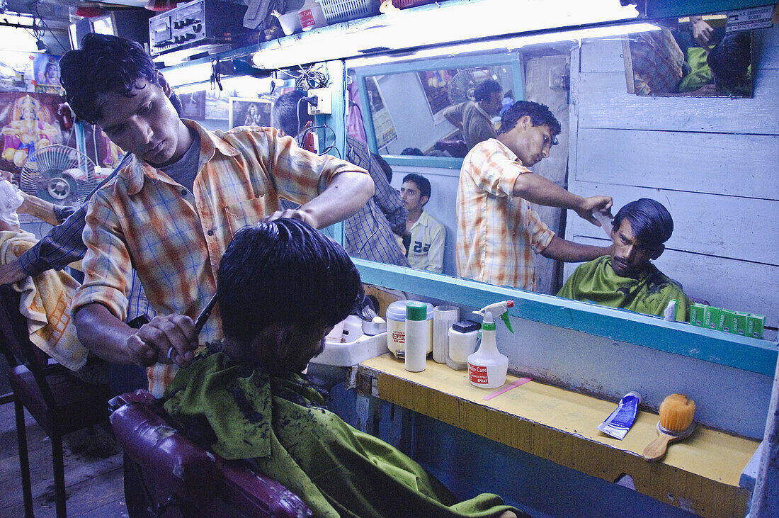 Barbershop night scene Kullu,  Himachal Pradesh,  India