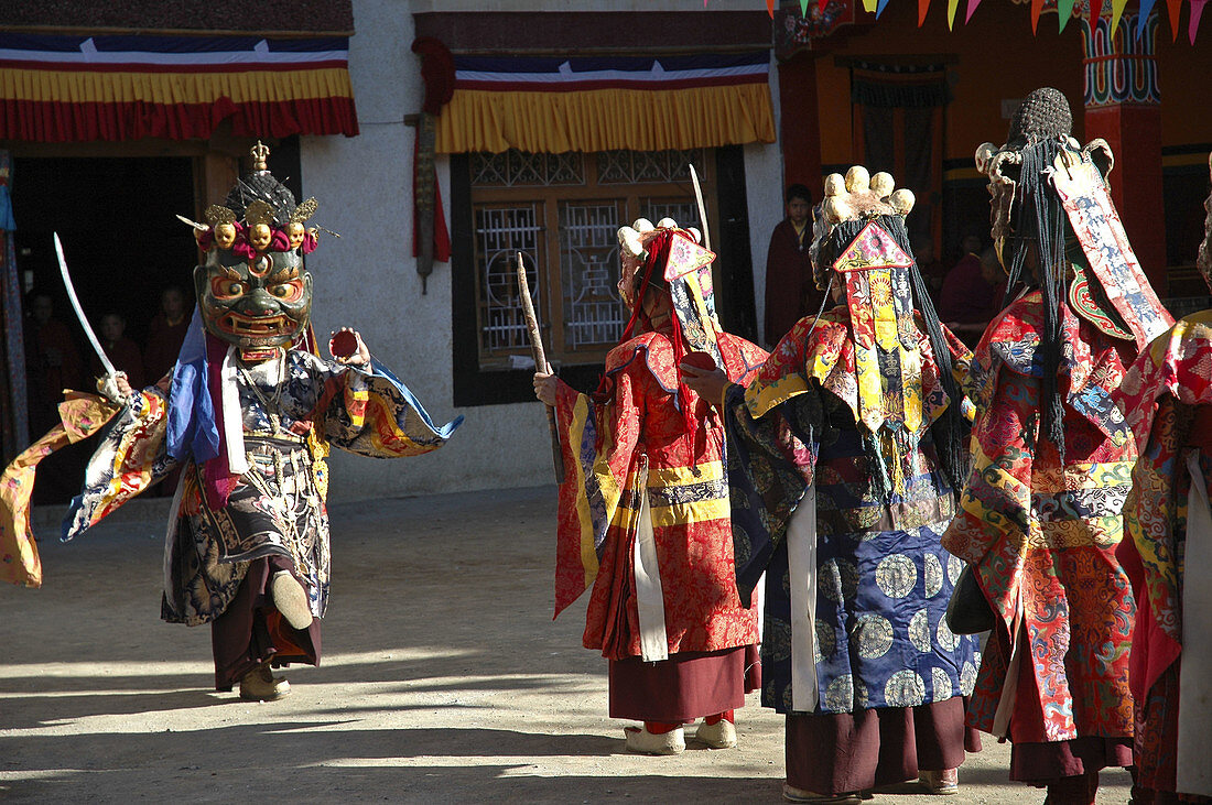 Masked monks dancing during a festival at Lama Yuru monastery Ladakh,  India
