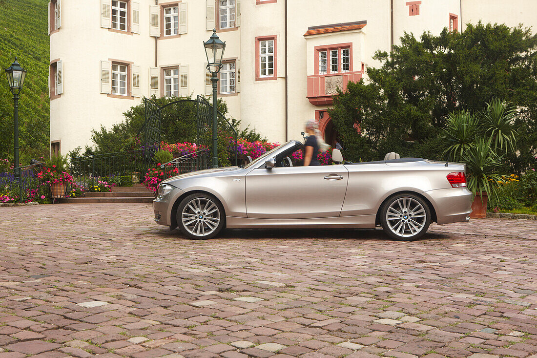 Convertible near Neuweier castle, Baden-Baden, Black Forest, Baden-Wuerttemberg, Germany