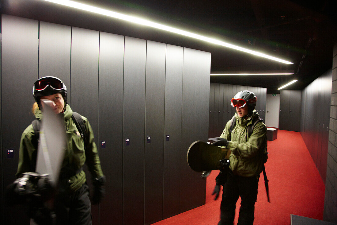 Two snowboarders in a locker room, Rocksresort, Laax, Canton of Grisons, Switzerland