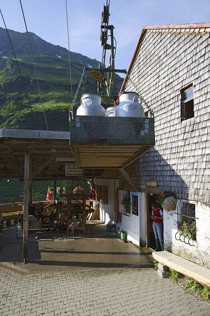 Transporting milk by cable car,  Laufbichl Alpe alpine dairy, Hintersteiner Tal, Bad Hindelang, Allgau, Swabia, Bavaria, Germany