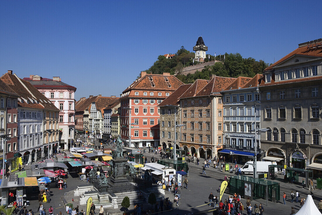 Main square and the remains of the castle on Schlossberg with the clocktower,a Graz landmark, Styria, Austria