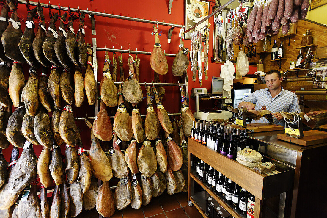 Seller inside a butchery, Ronda, Andalusia, Spain