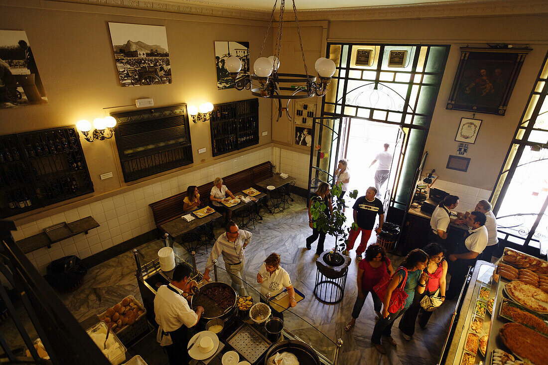 Guests inside the Antica Focacceria San Francesco, Palermo, Sicily, Italy