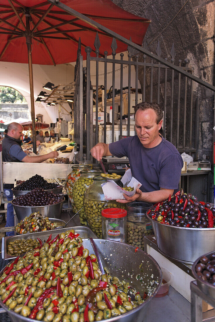 Olives offered on fish market, Catania, Sicily, Italy