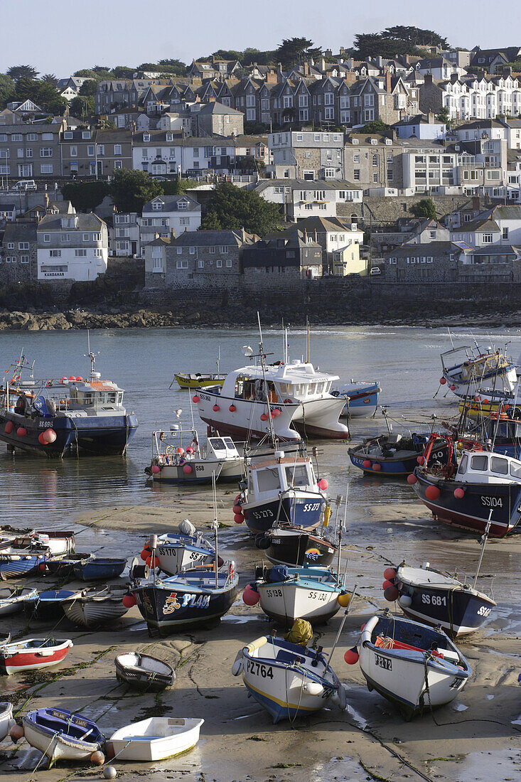 Boats in harbor at low tide, St Ives, Cornwall, England, Great Britain