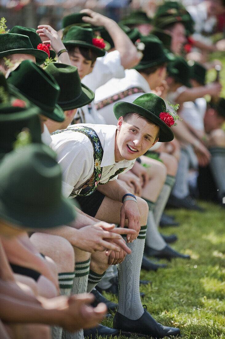 Young men wearing traditional costumes, May Running, Antdorf, Upper Bavaria, Germany