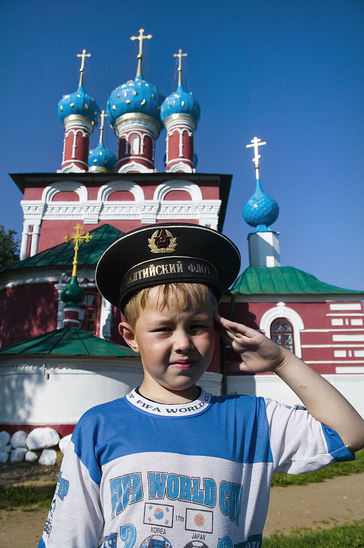 Boy in front of the Church of St Demetrios on the Blood, Uglich. Golden Ring, Russia