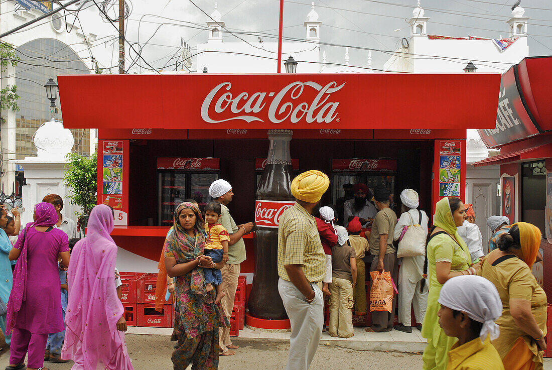 People at a snack bar in front of the Golden Temple, Sikh holy place, Amritsar, Punjab, India, Asia
