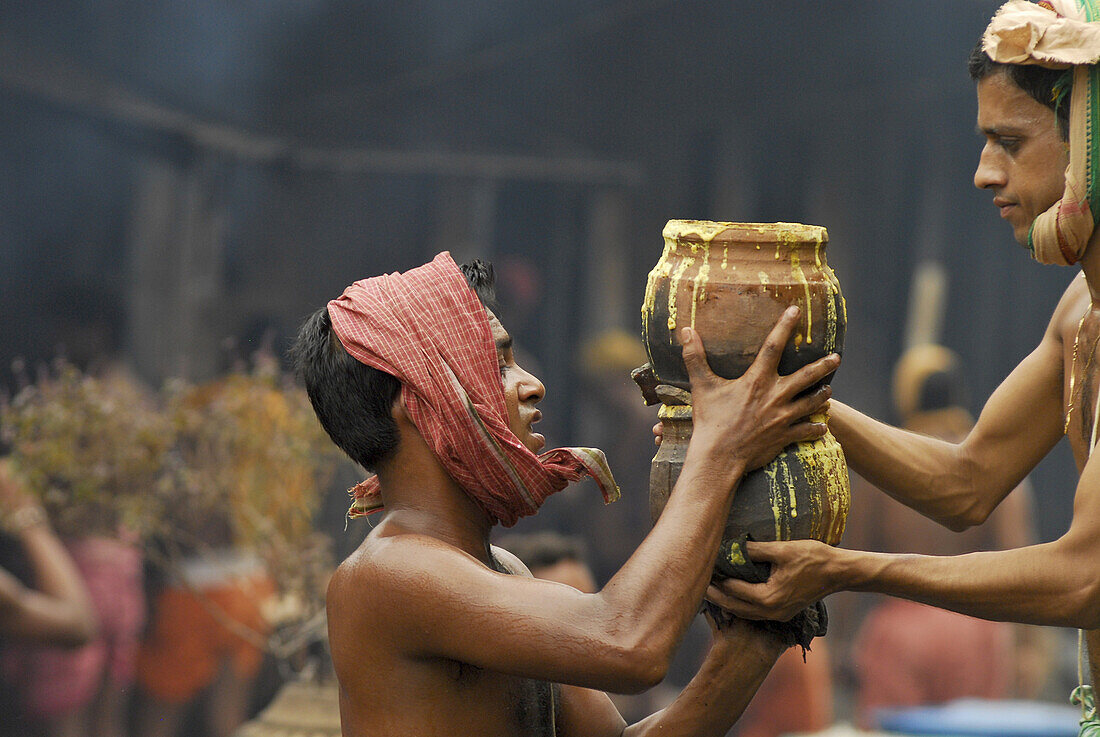 Young men carrying oblations, Ananta Vasudeva Temple, Bhubaneswar, Orissa, Asia