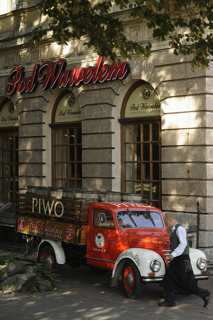 Old beer truck in front of Pod Wawelem restaurant, Krakow, Poland, Europe