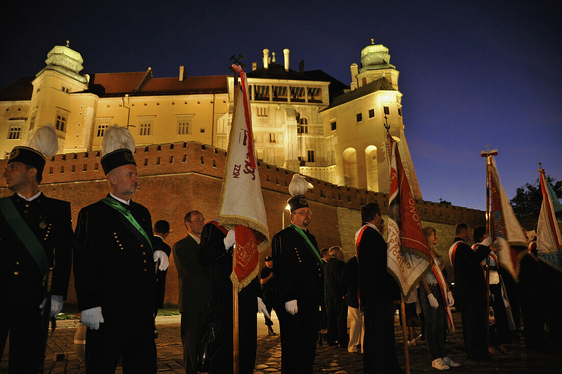 People at commemoration at Katyn Memorial below Wawel castle, Krakow, Poland, Europe