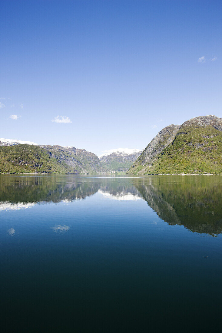 Fjord landscape under blue sky at the Maurangsfjord, Folgefonn peninsula, Kvinnherad, Hardanger, Hordaland, Norway, Scandinavia, Europe