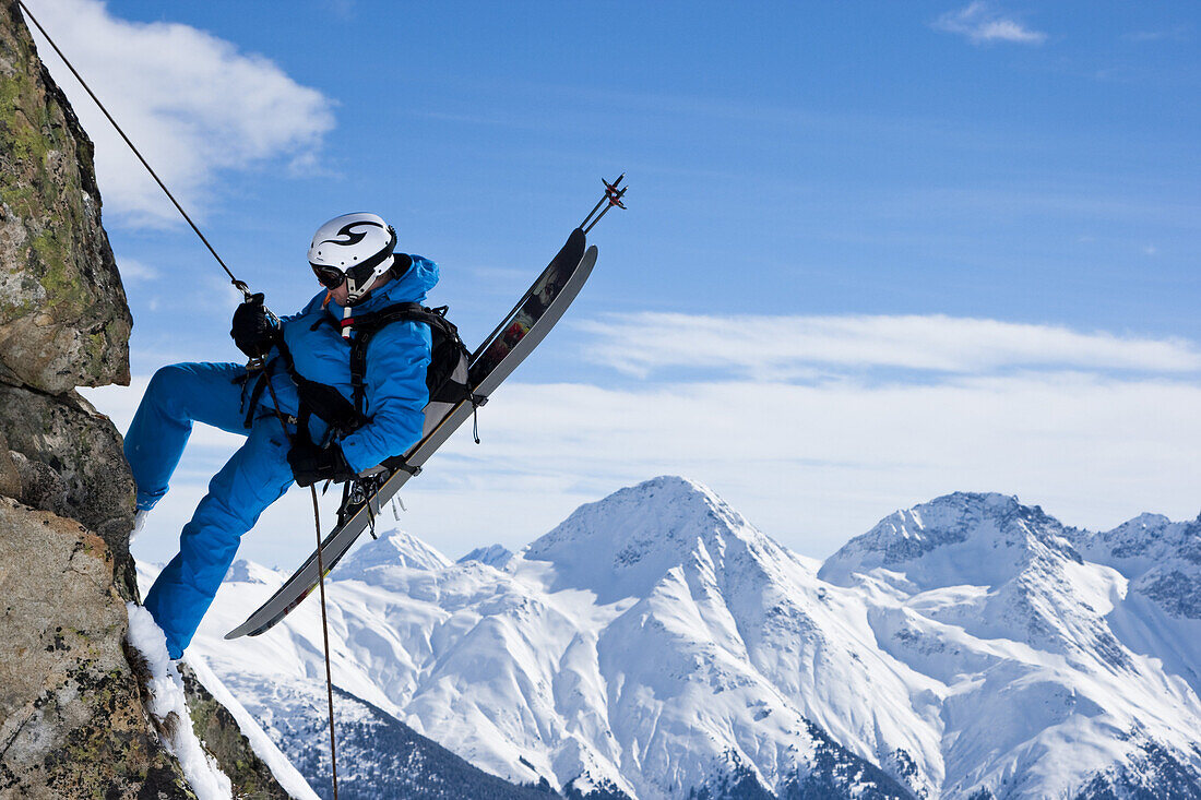 Skier rappeling, Disentis, Surselva, Grisons, Switzerland