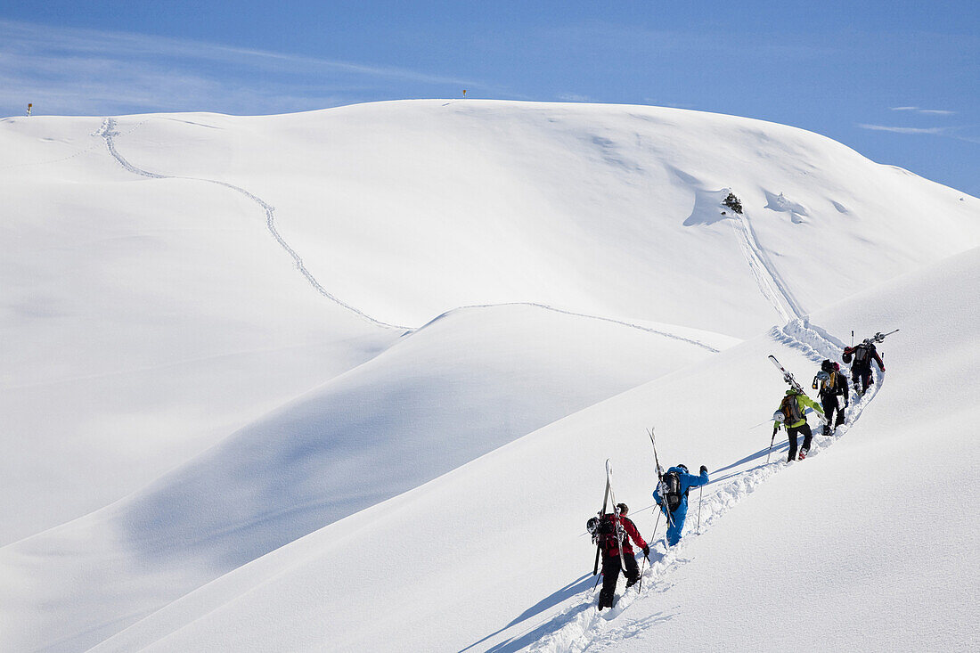 Skiers ascending, Val Segnas, Disentis, Surselva, Grisons, Switzerland