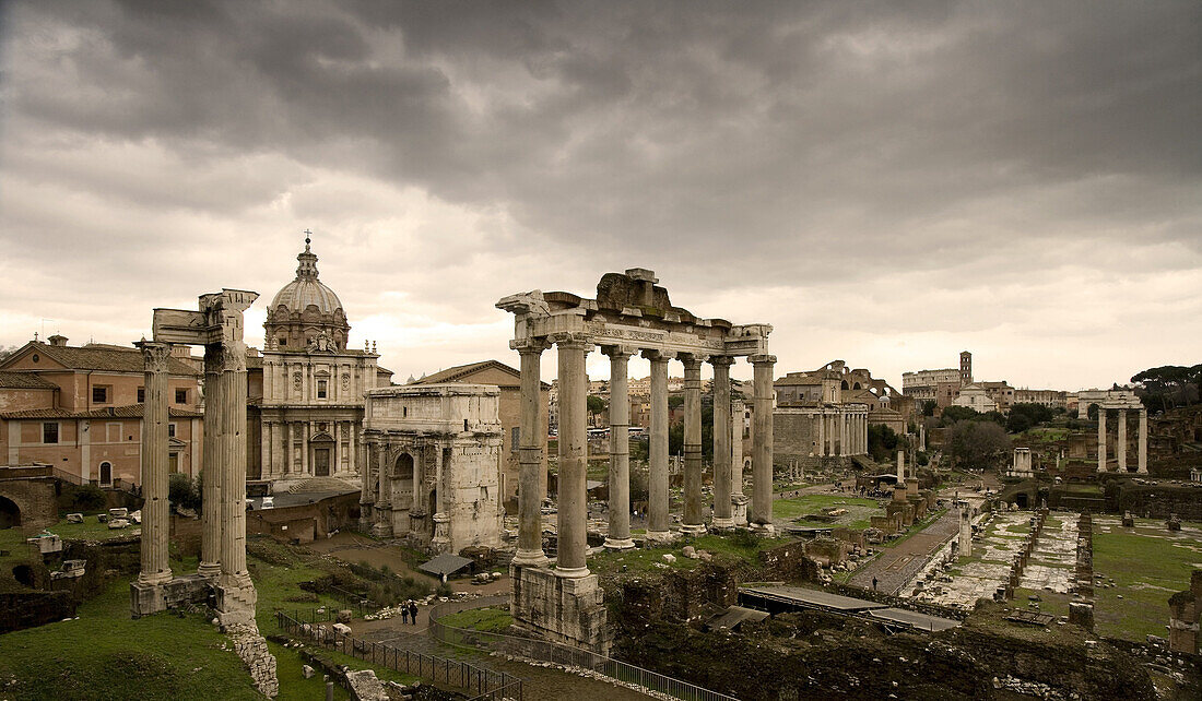 View from Piazza del Campidoglio towards the Temple of Saturn and the arch of Septimus Severus, Roman Forum, Rome, Italy, Europe