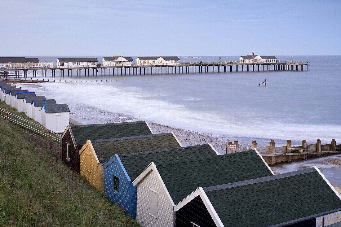 Beach huts and Pier in Southwold, East Anglia, Suffolk, England, Great Britain, Europe