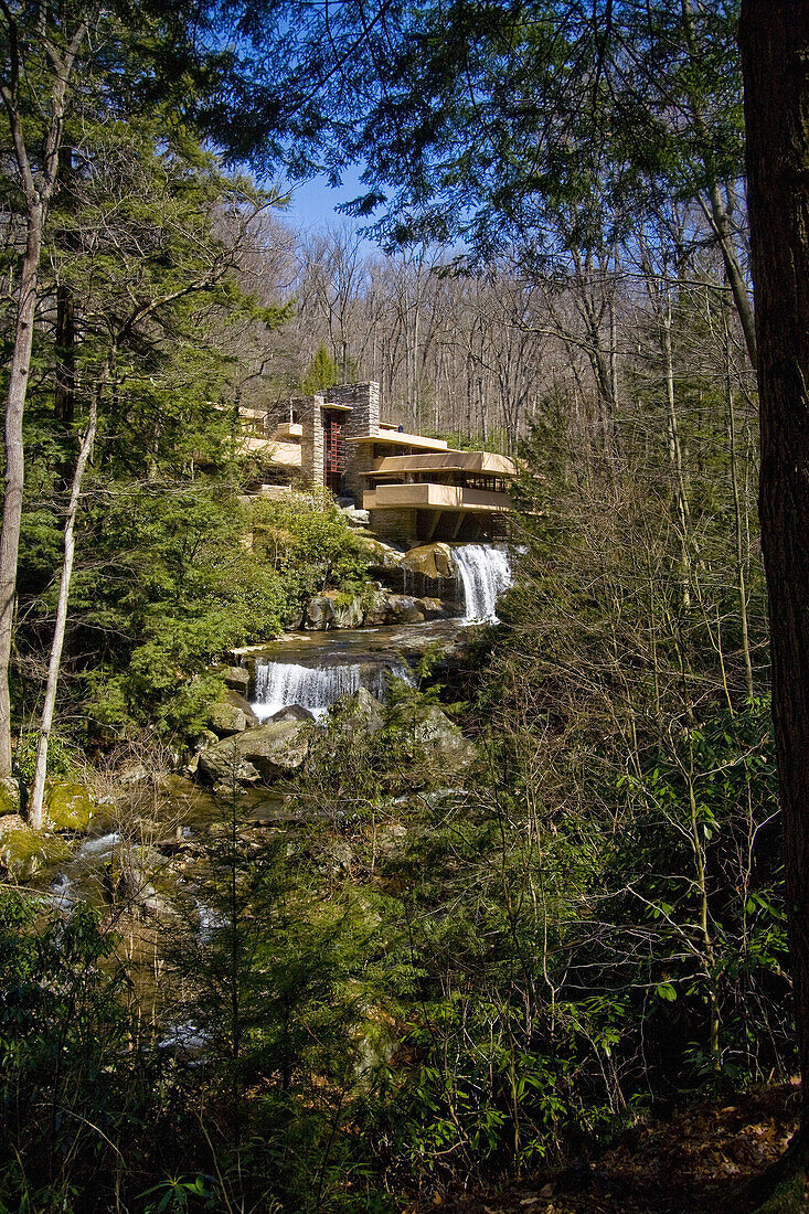 Upstream exterior view of Fallingwater  Also known as the Edgar J  Kaufmann Sr  Residence, Fallingwater was designed by American architect Frank Lloyd Wright in 1934 in rural southwestern Pennsylvania, 50 miles southeast of Pittsburgh  The house was built