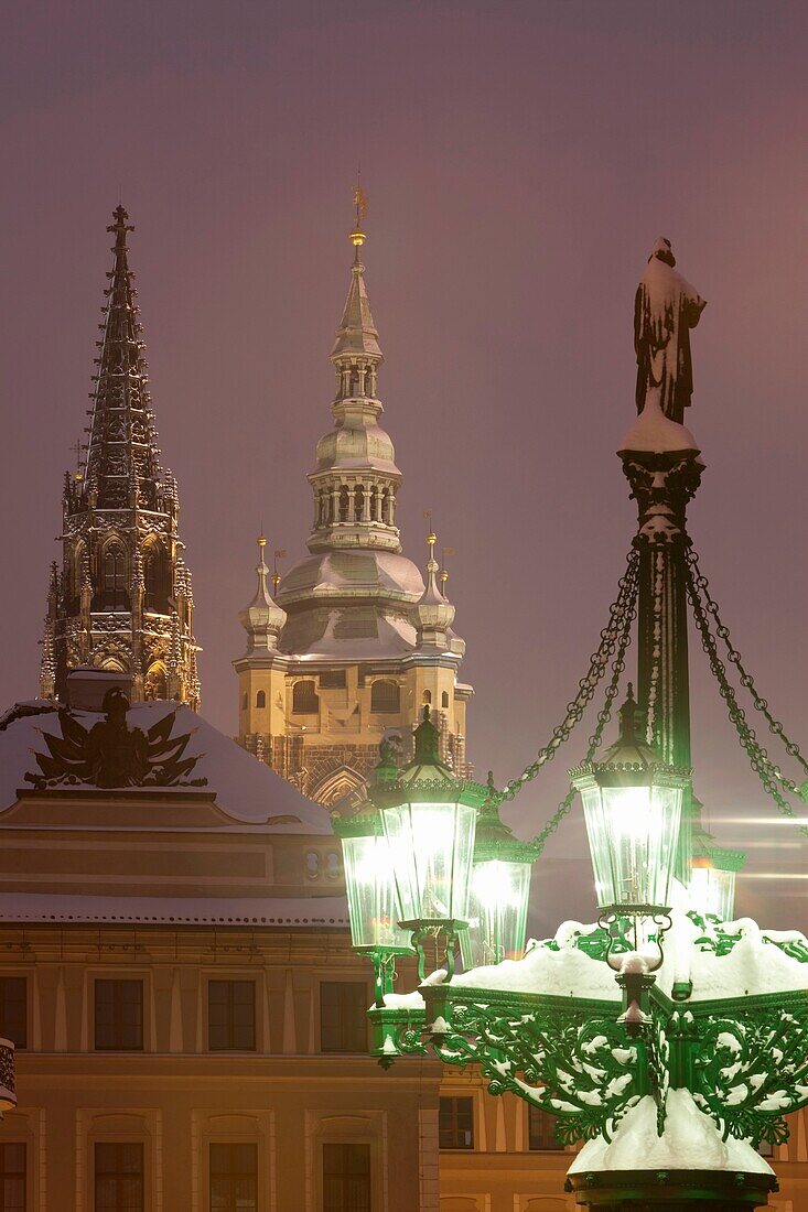 prague - gas lantern and st  vitus cathedral at hradcany castle