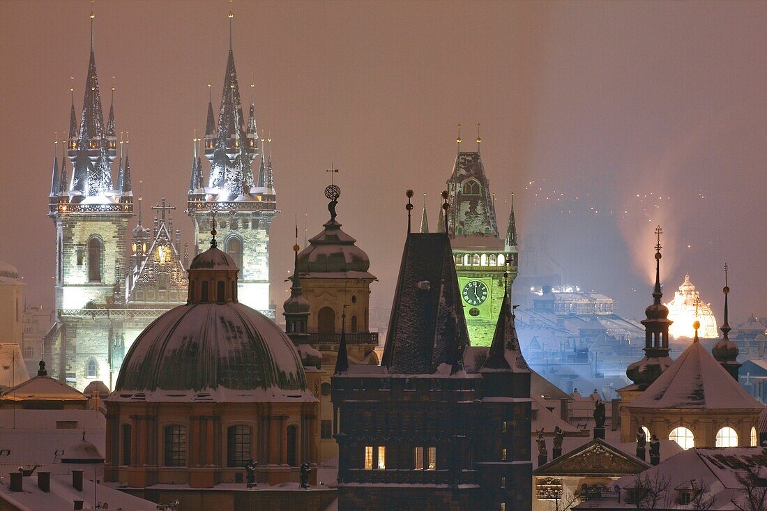 prague - spires of the old town during heavy snowfall