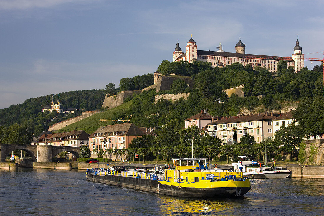 Festung Marienberg fortress and Main River ship in the morning, Wurzburg, Bavaria, Germany