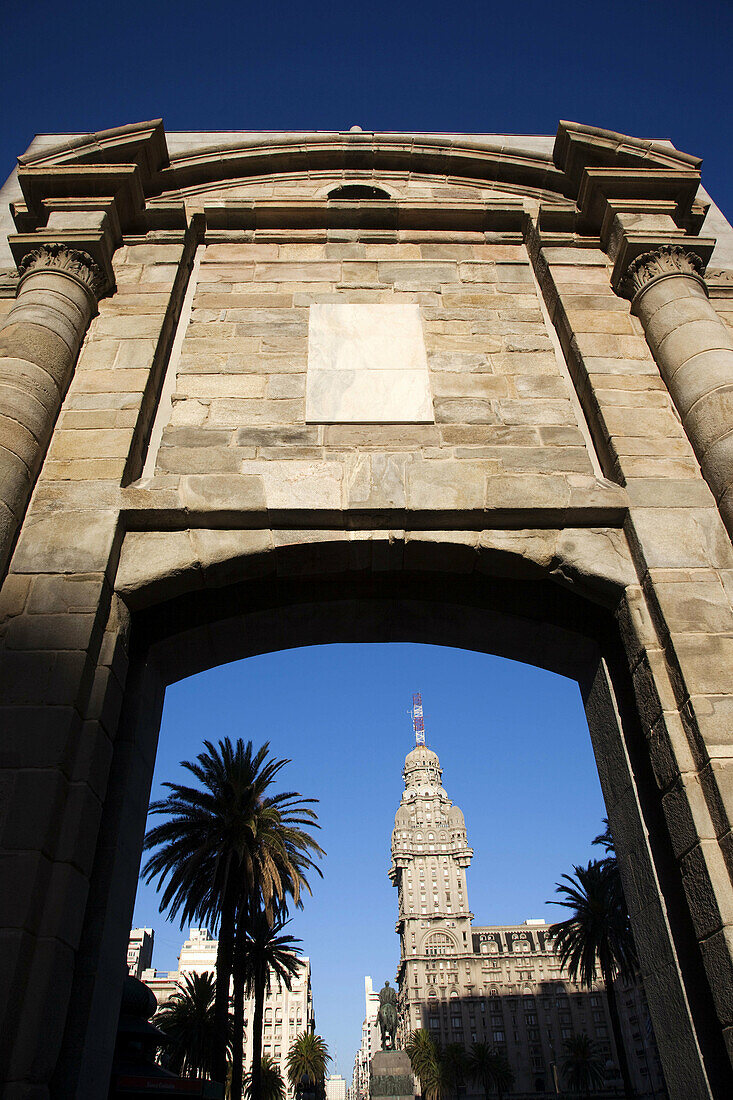 Puerta de la Ciudadela old city gate and Palacio Salvo building, Montevideo, Uruguay
